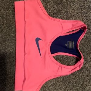 Pink with navy nike logo sports bra